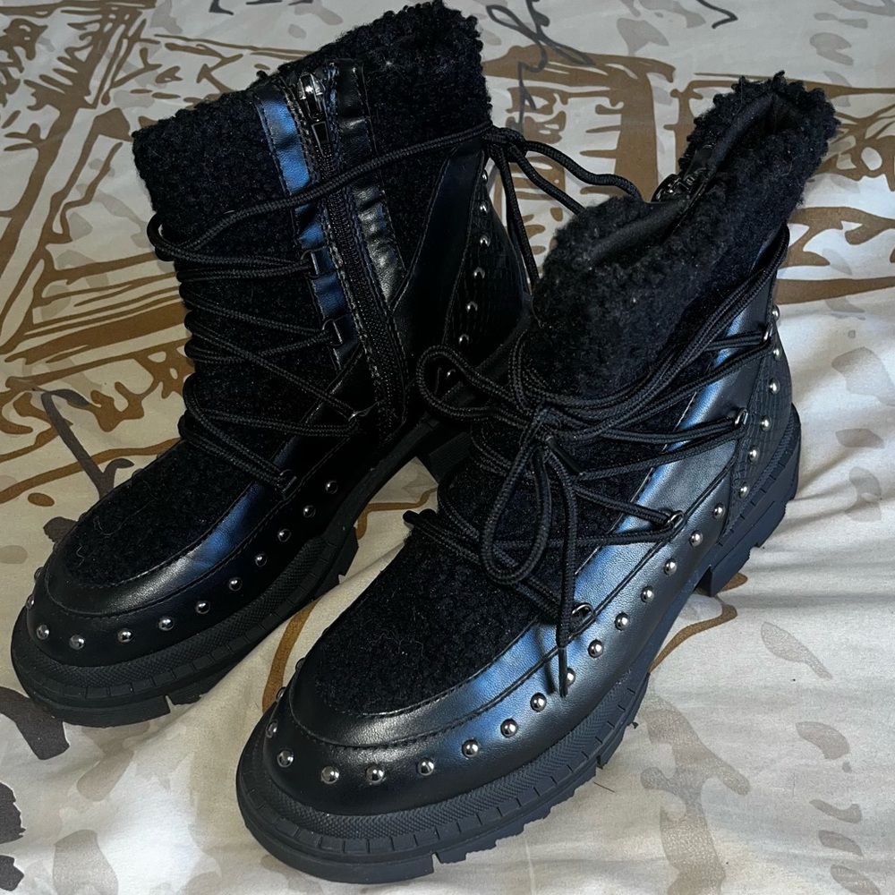 Black JUSTFAB faux leather and faux fur studded boots